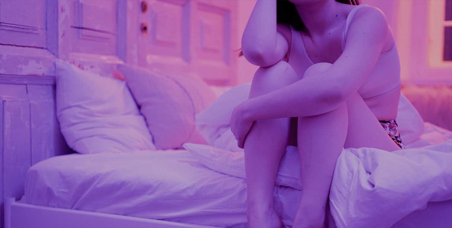 girl in bed stressed