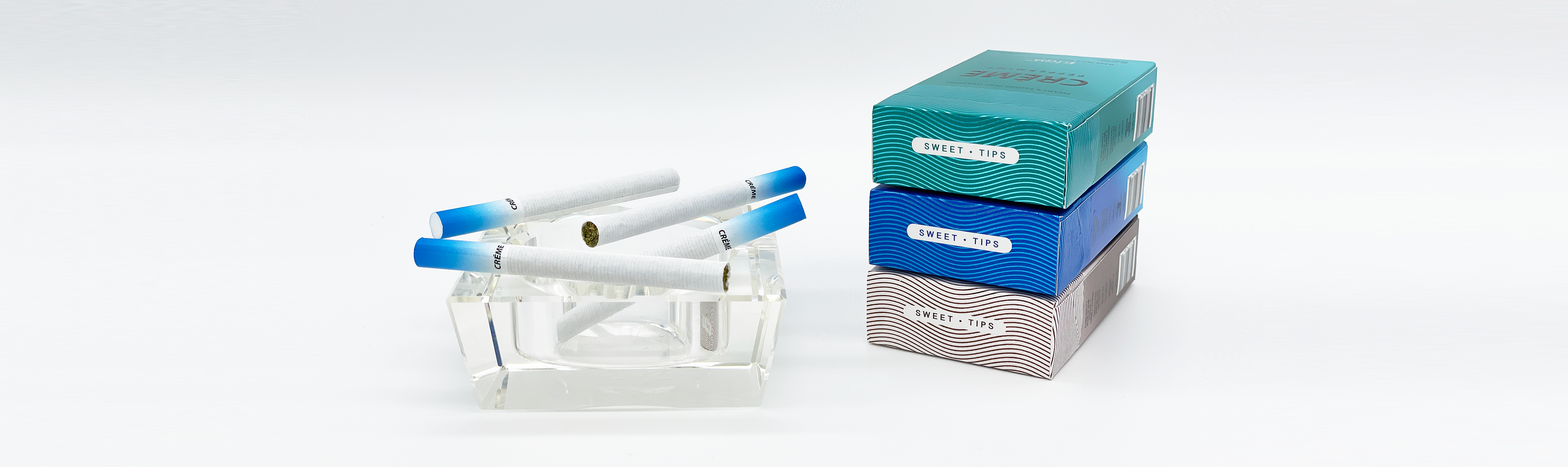 ashtray with hemp cigarette singles and packs